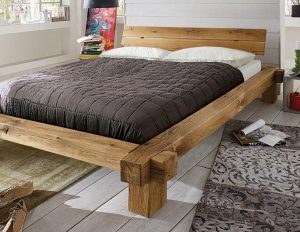 Деревянная кровать – практичность и красота
